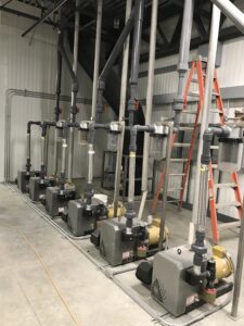 claw pump central vacuum system in poultry processing plant